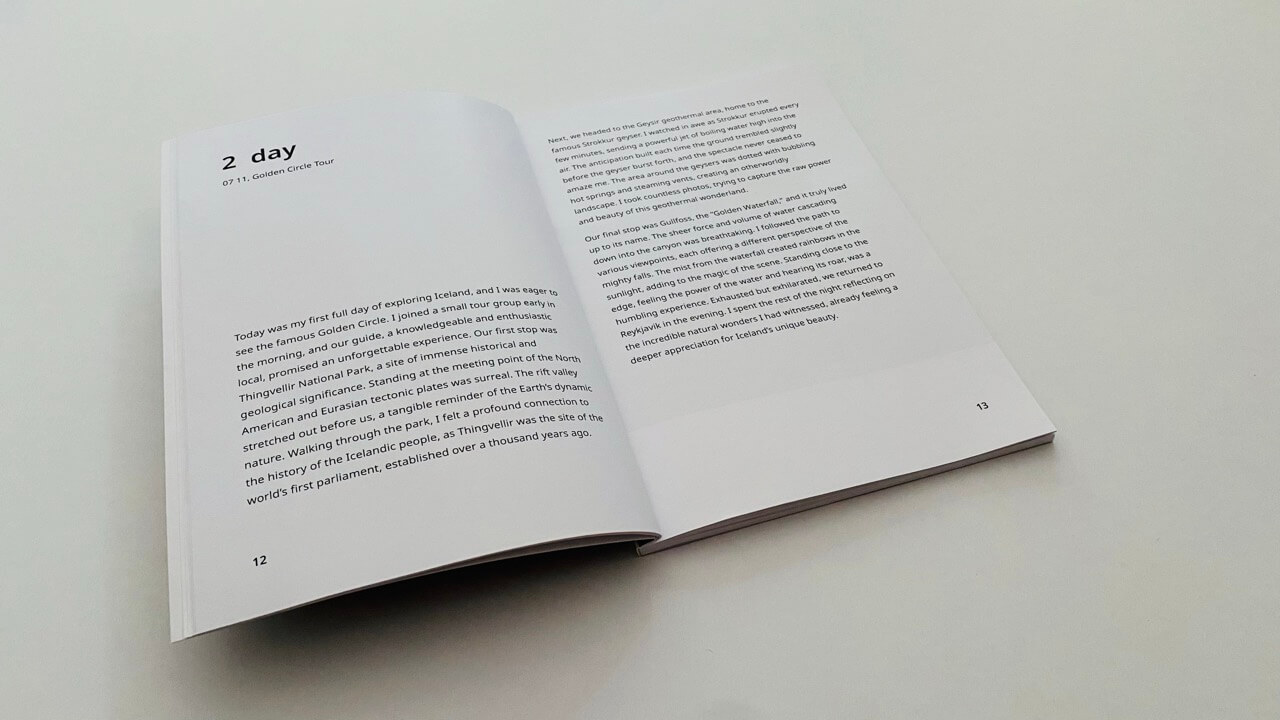 An open kikōbook travel diary: a full written entry for day two spread across pages 12 and 13